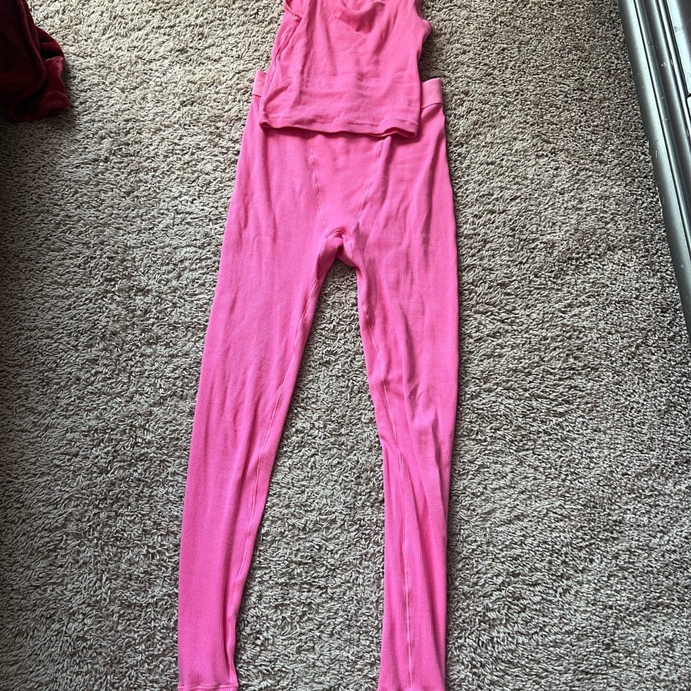 SKIMS Pink Tank Top and leggings